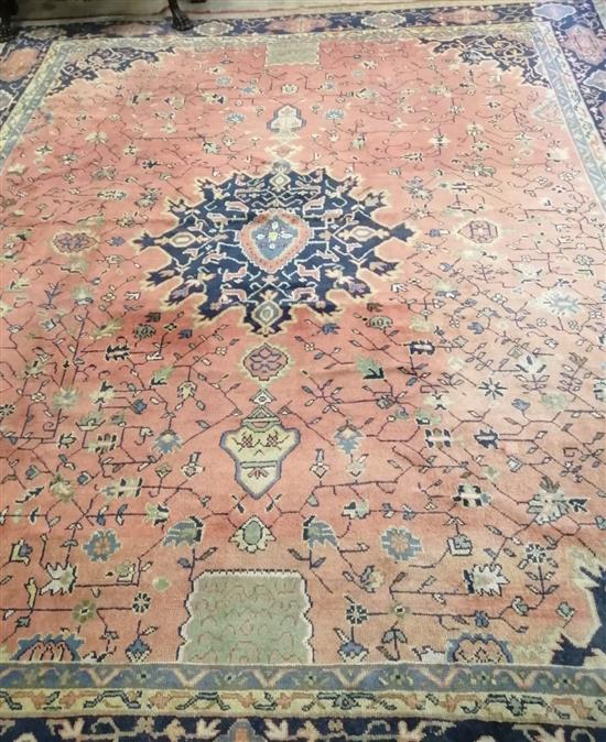 A Tabriz red ground carpet, 470 x 410cm